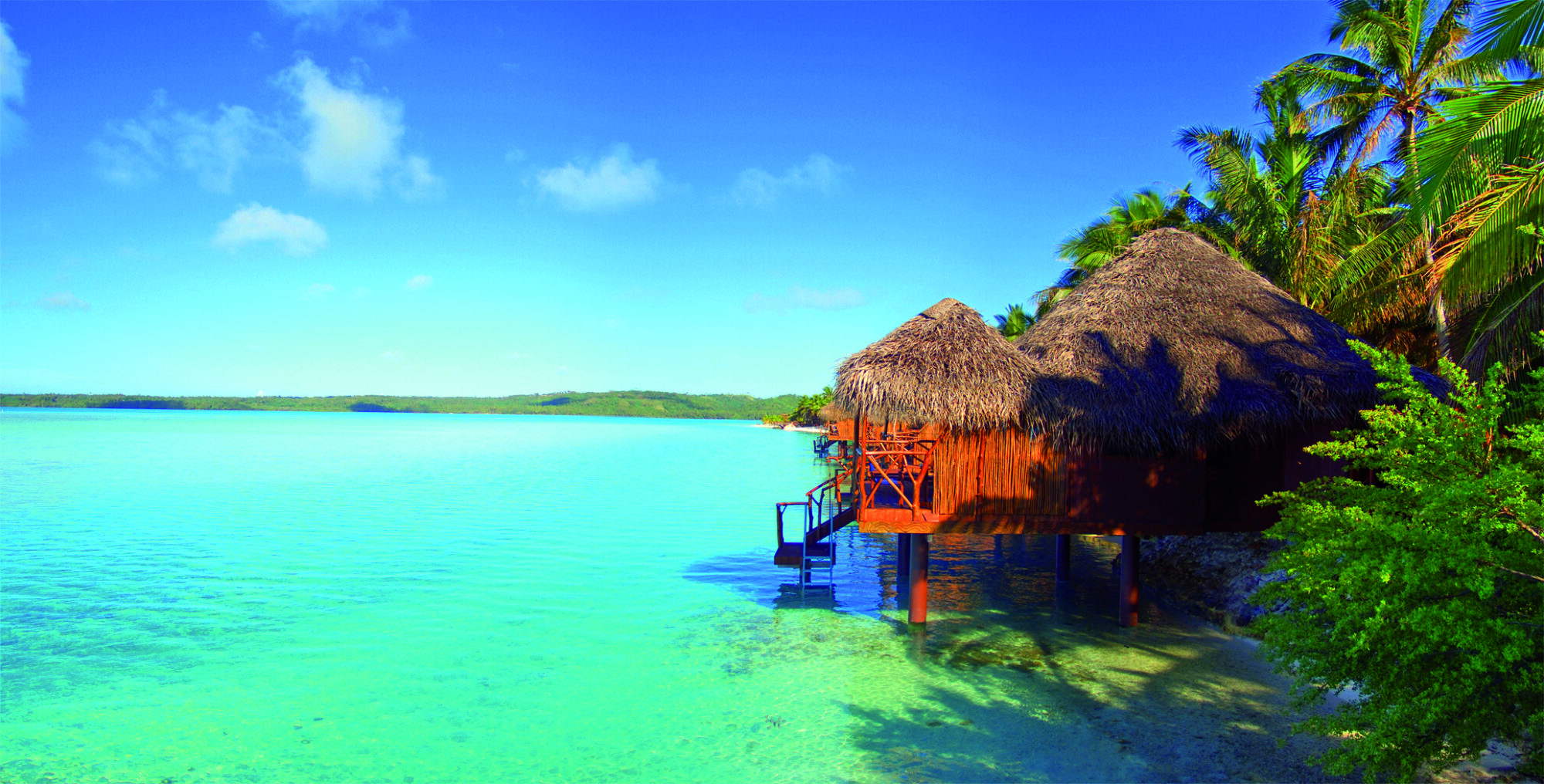 Luxury overwater bungalows at Aitutaki Lagoon Private Island Resort